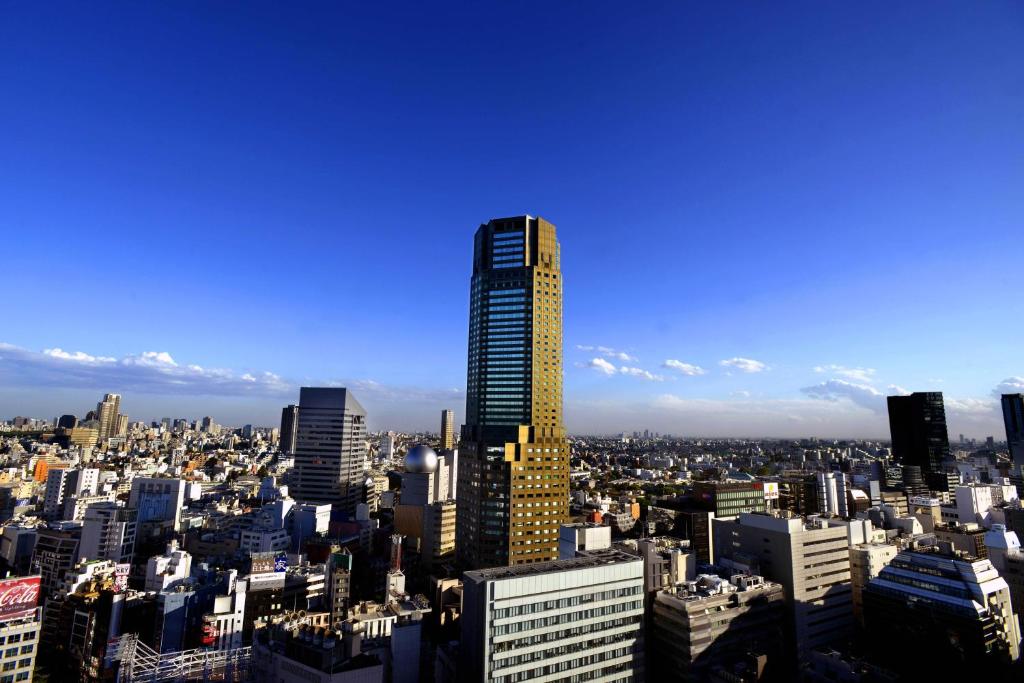 a tall skyscraper in a large city at Cerulean Tower Tokyu Hotel, A Pan Pacific Partner Hotel in Tokyo