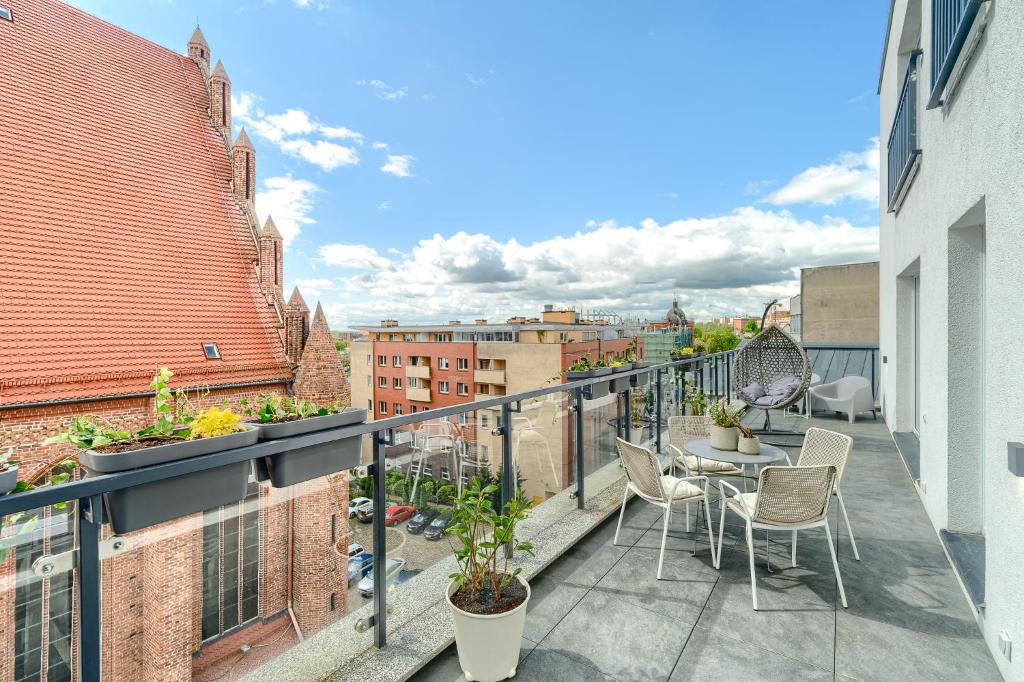 Balkón alebo terasa v ubytovaní Apartament Prezydencki bulwary Stare Miasto Apartamenty No 1