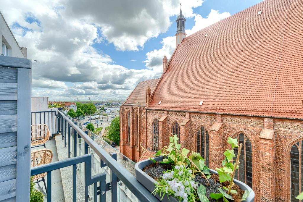 Balkón alebo terasa v ubytovaní Apartament Prezydencki bulwary Stare Miasto Apartamenty No 1