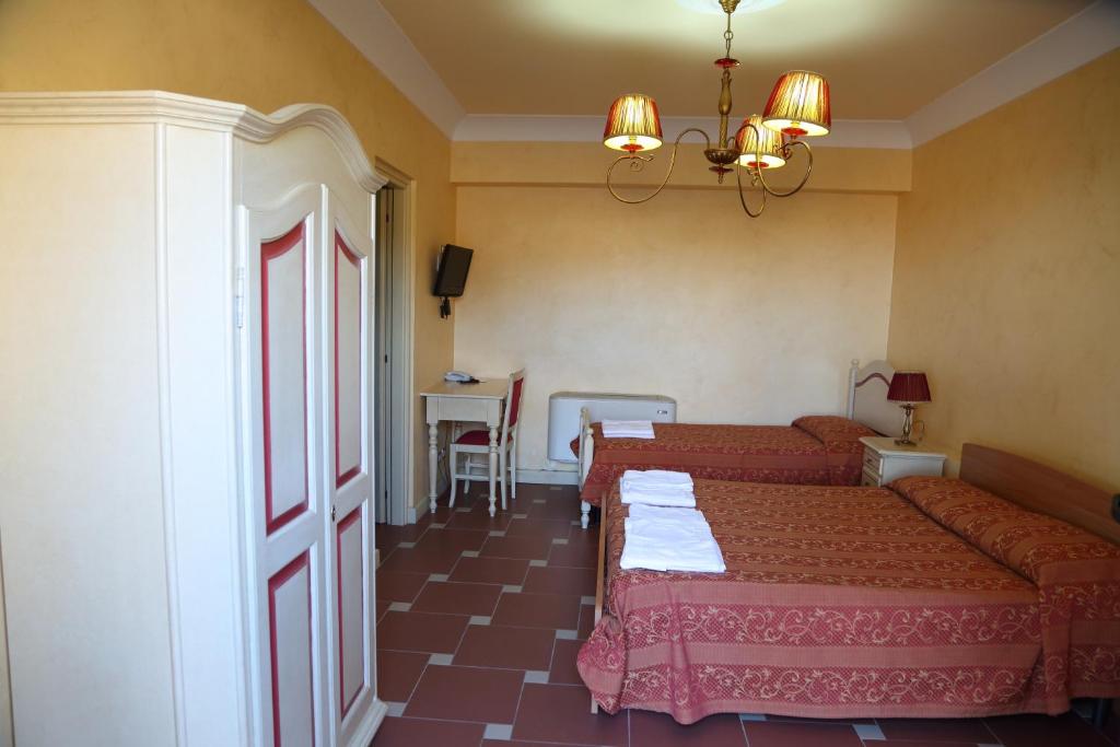 Posteľ alebo postele v izbe v ubytovaní Agriturismo Monticelli