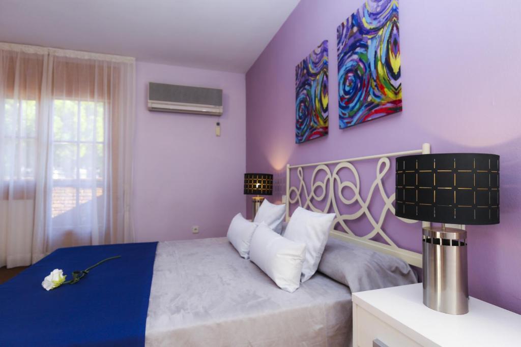 Posteľ alebo postele v izbe v ubytovaní GERANIS VILLA ONLY FAMILIES Planet Costa Dorada