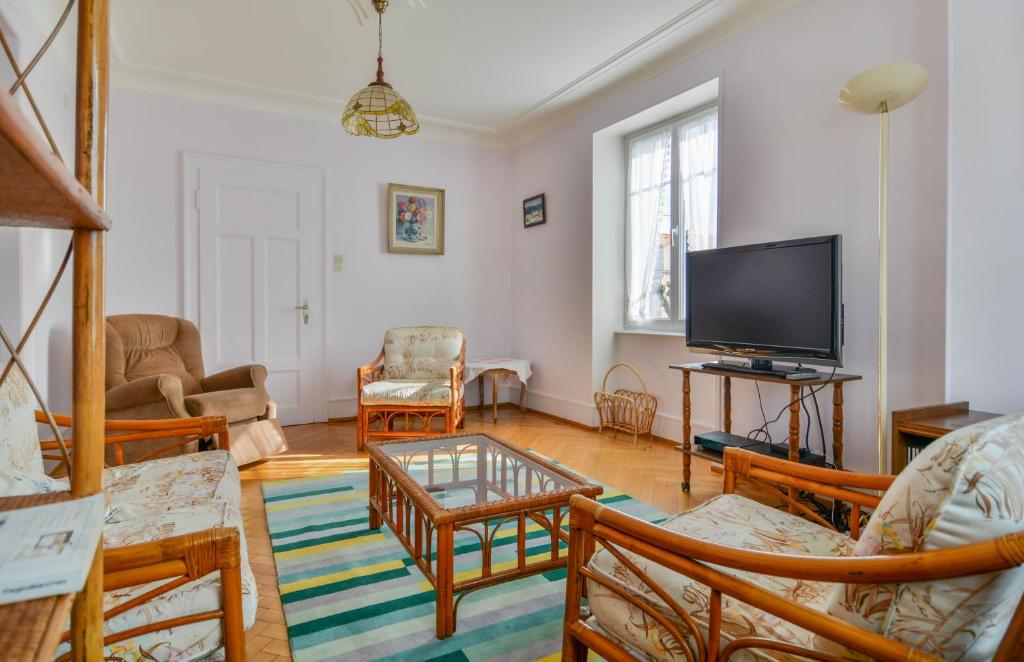 TV a/nebo společenská místnost v ubytování Gîte Le Noisetier