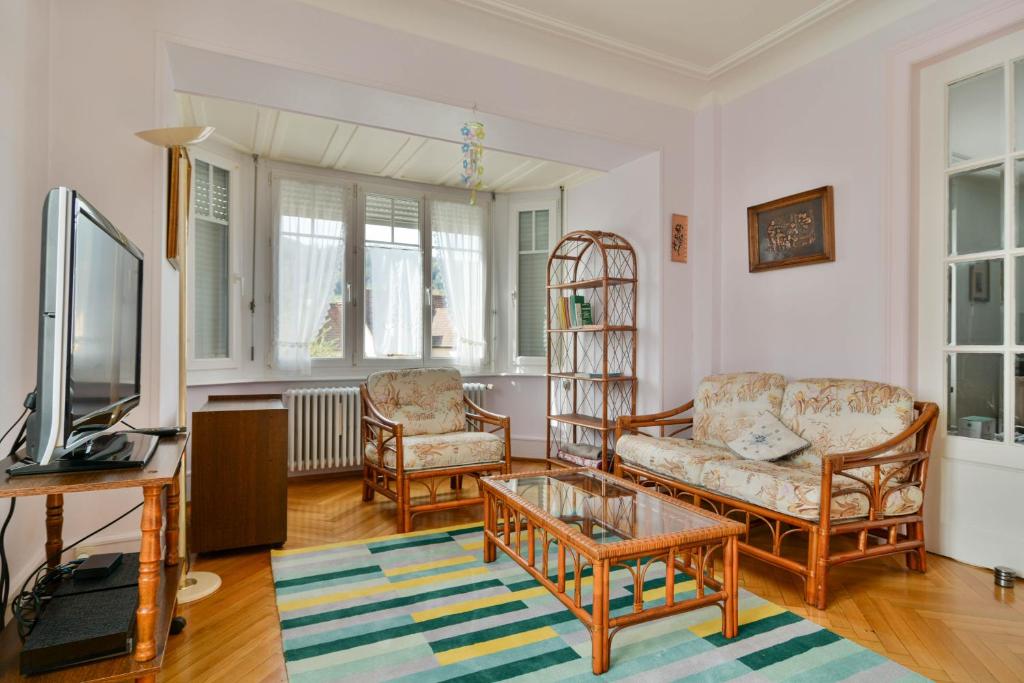 TV a/nebo společenská místnost v ubytování Gîte Le Noisetier