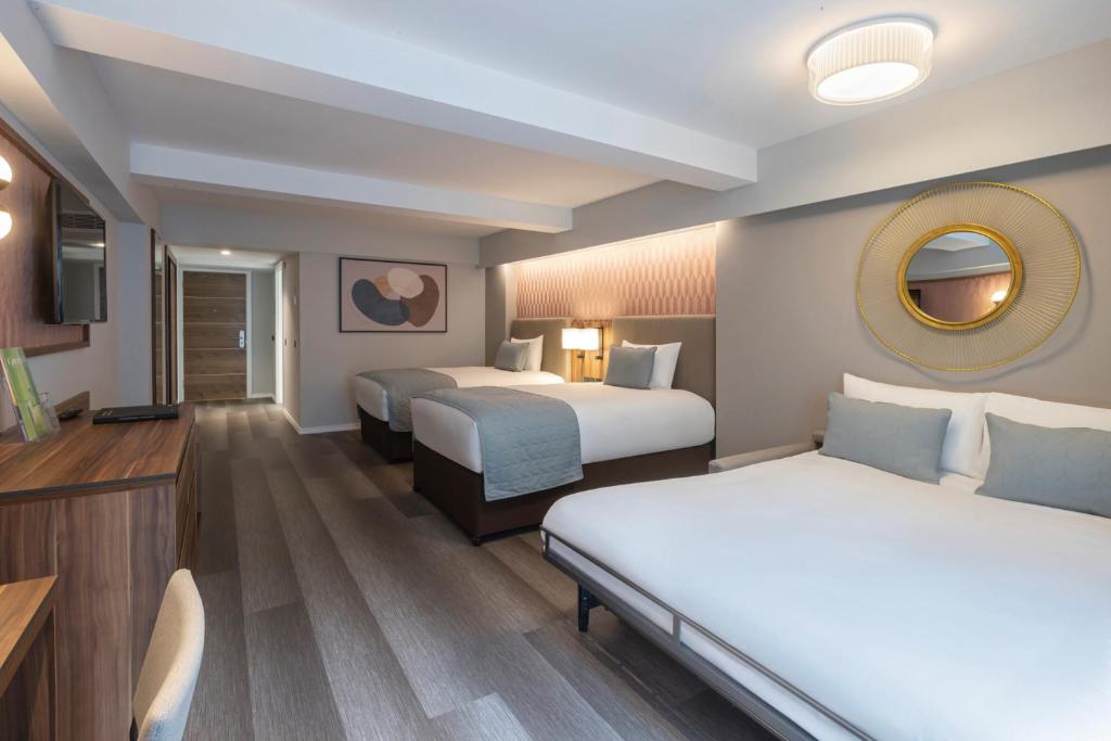Voodi või voodid majutusasutuse Riu Plaza The Gresham Dublin toas