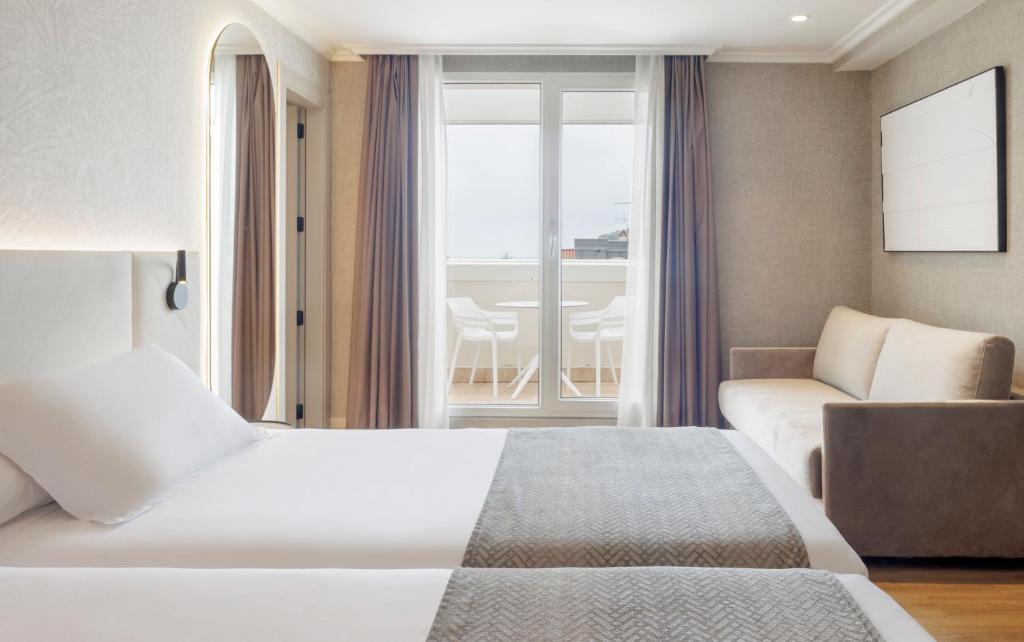 Postel nebo postele na pokoji v ubytování Hotel Ilunion San Sebastián