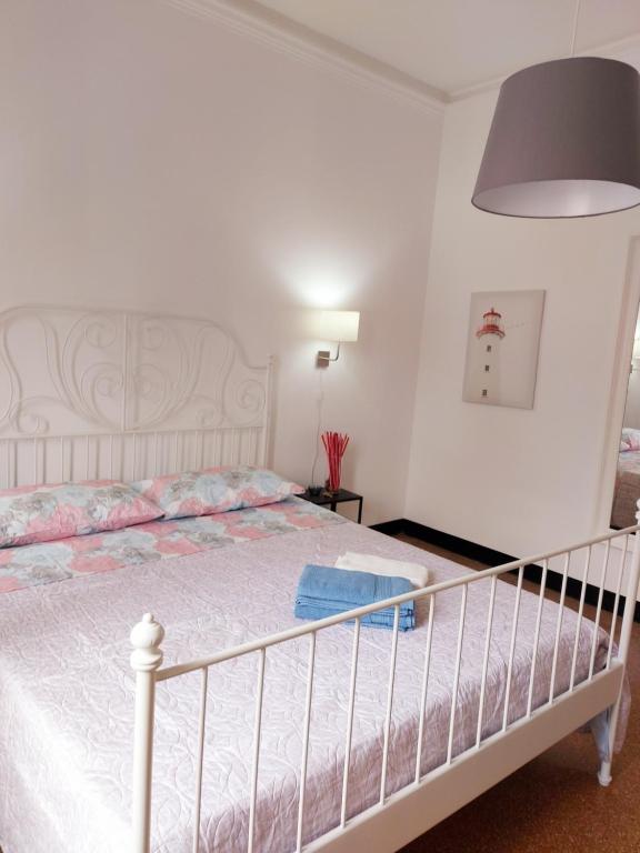 Postel nebo postele na pokoji v ubytování Brignole C Genova Rooms
