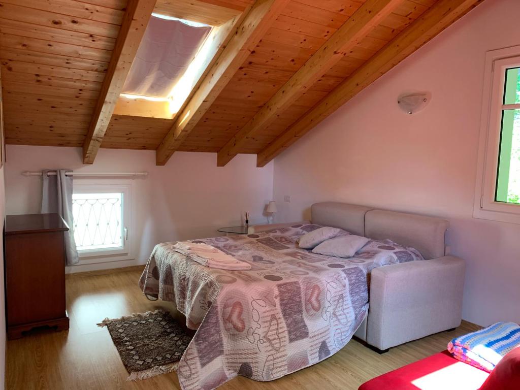 Postel nebo postele na pokoji v ubytování Al Castello