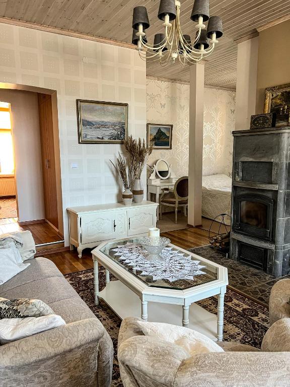 Posezení v ubytování Spacious 1-bedroom apartment with Sauna