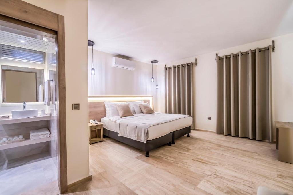 Postel nebo postele na pokoji v ubytování Manzara Boutique Hotel - Adults Only