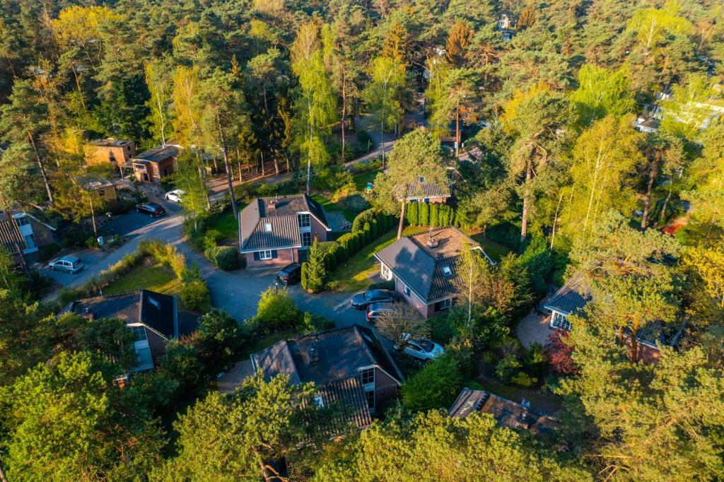 an aerial view of a house in the woods at EuroParcs Beekbergen in Beekbergen