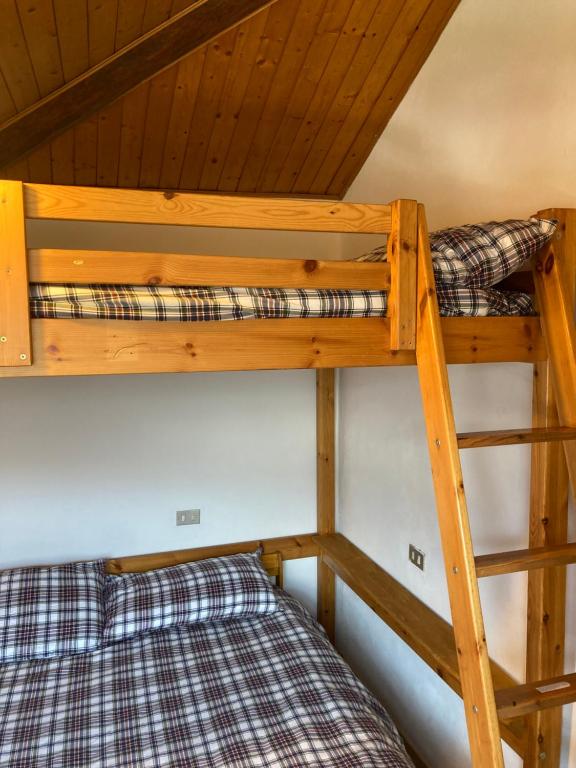 Postel nebo postele na pokoji v ubytování Tabià delle Volpi