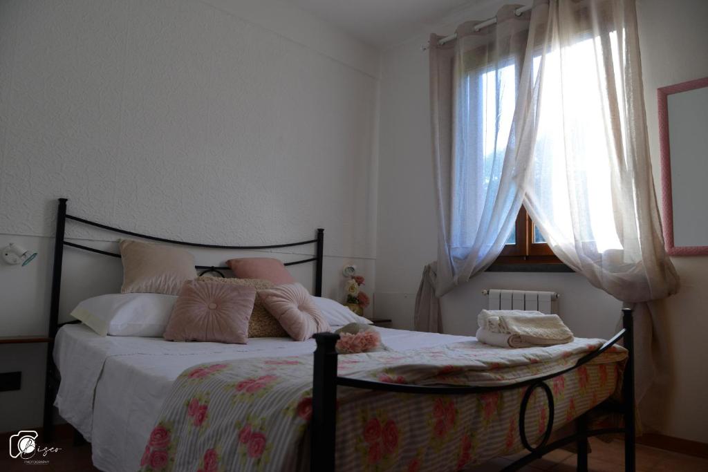 A bed or beds in a room at Casa Verde Country House
