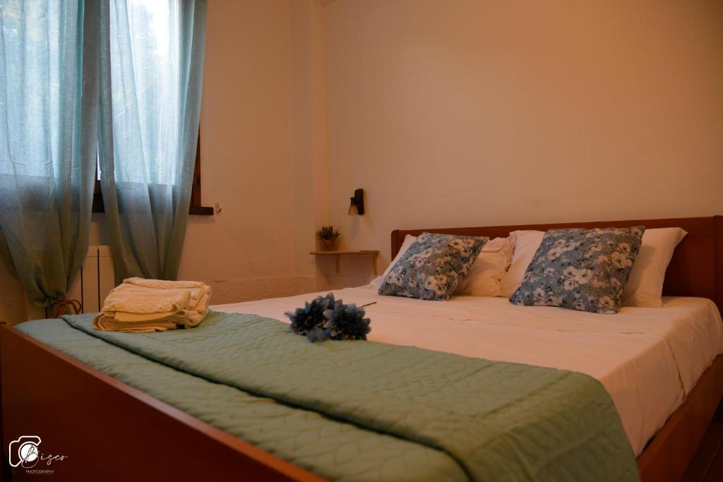 A bed or beds in a room at Casa Verde Country House