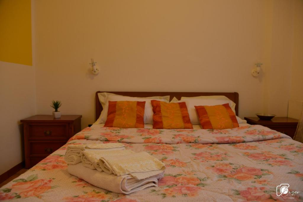 A bed or beds in a room at Casa Verde Country House