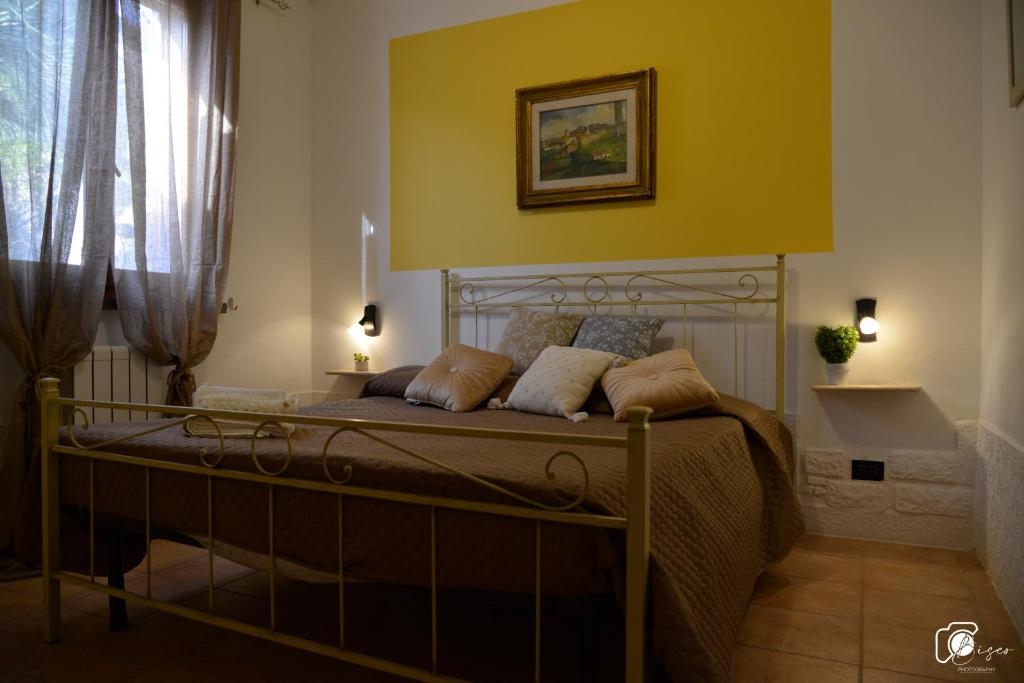 A bed or beds in a room at Casa Verde Country House