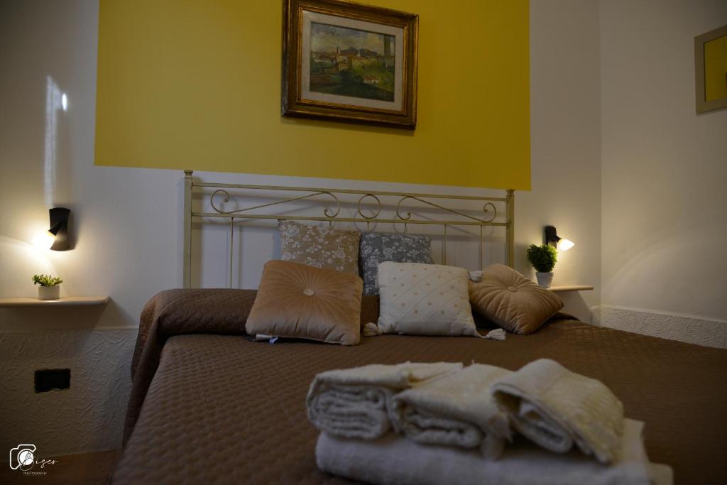 A bed or beds in a room at Casa Verde Country House