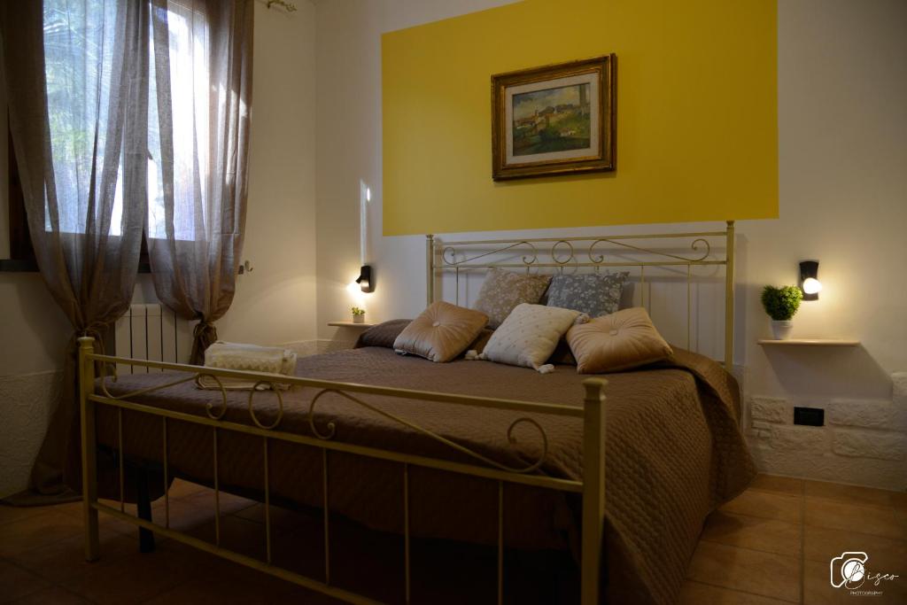 A bed or beds in a room at Casa Verde Country House
