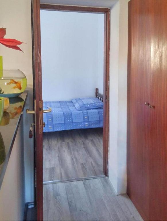 Posteľ alebo postele v izbe v ubytovaní Apartments and Room Lotus