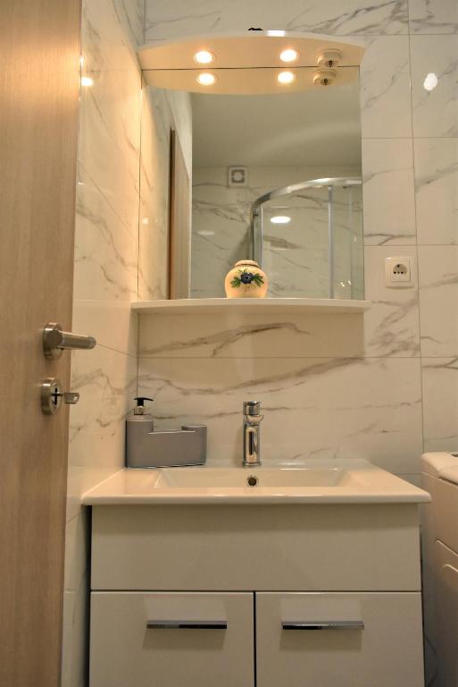 Koupelna v ubytování Apartmani Škorpion