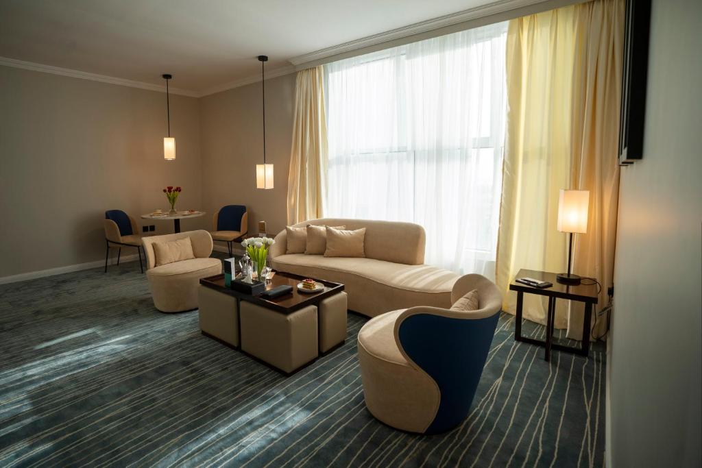 Posezení v ubytování Prime Al Corniche Hotel