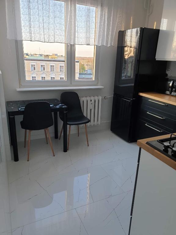Kuchyňa alebo kuchynka v ubytovaní Apartament Stanley