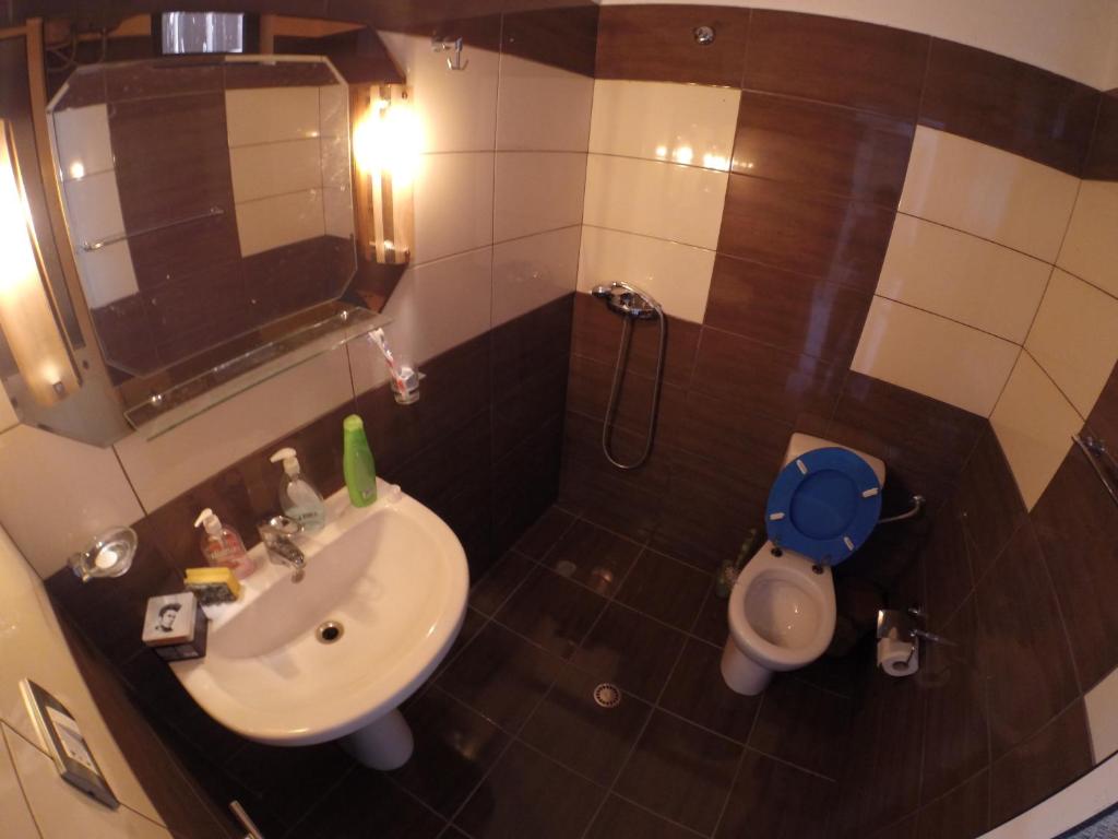 Koupelna v ubytování Hotel Buza