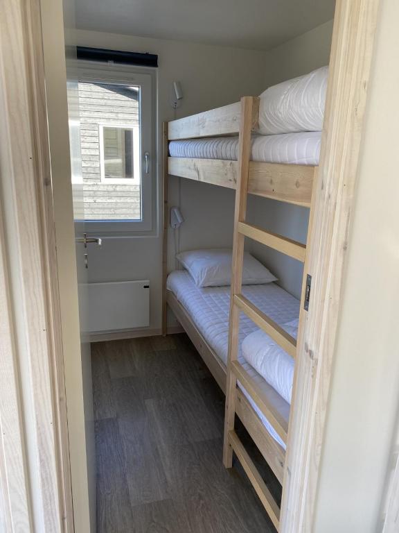 Postel nebo postele na pokoji v ubytování Aa Strand Camping
