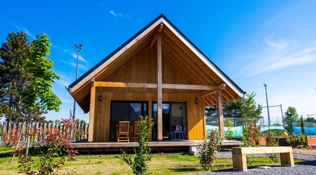 a small house with a pitched roof at Les Cottages de Ripaille in Thonon-les-Bains