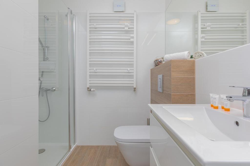 Kúpeľňa v ubytovaní Osiedle Feniks Kołobrzeg by Noclegi Renters