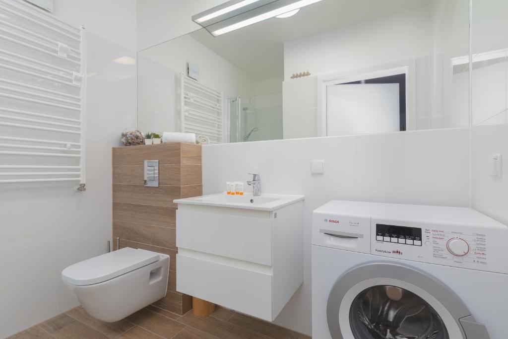 Kúpeľňa v ubytovaní Osiedle Feniks Kołobrzeg by Noclegi Renters