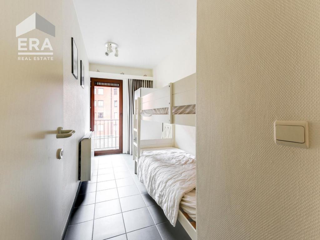 Ein Etagenbett oder Etagenbetten in einem Zimmer der Unterkunft Anaïs 0201