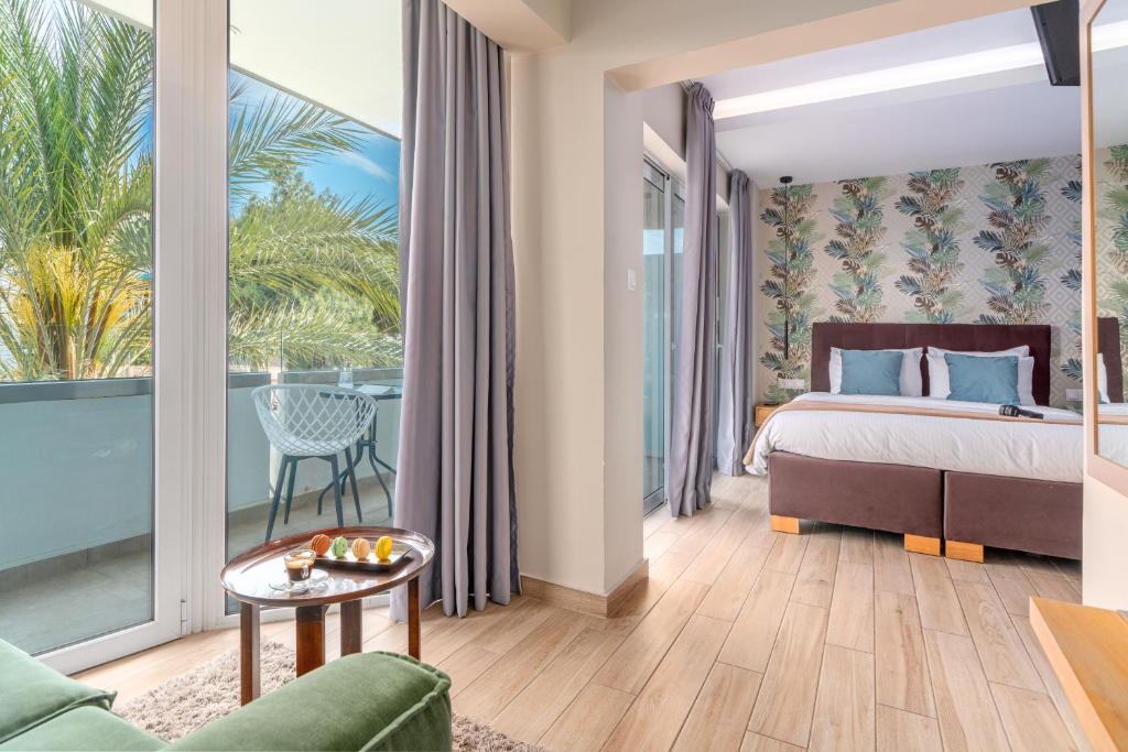 
Queen Suite with Balcony & Side Sea View
