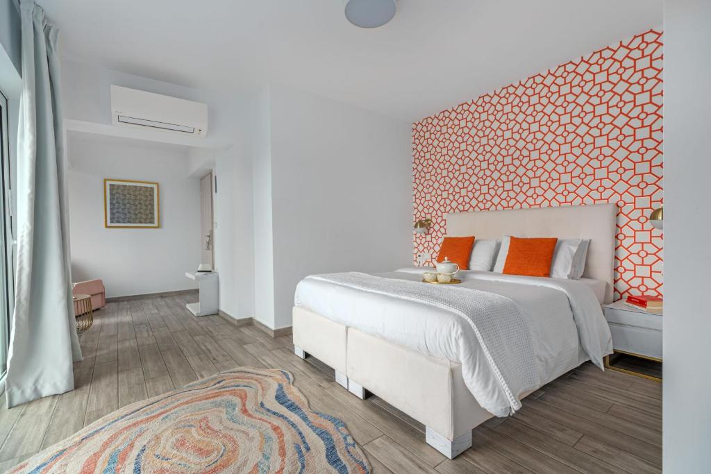 Ένα ή περισσότερα κρεβάτια σε δωμάτιο στο Maison 66, Riviera Hotels