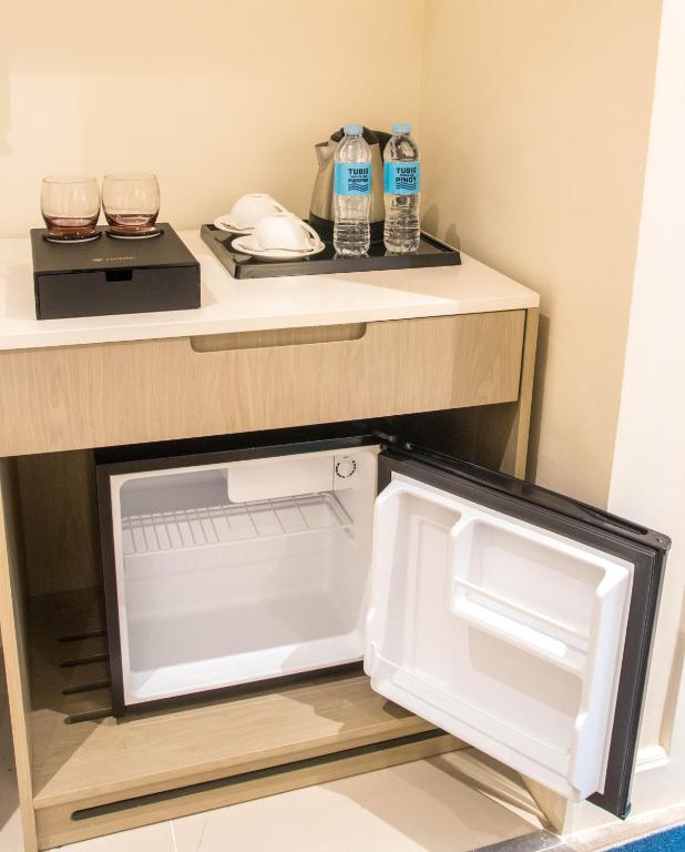 Kuchyň nebo kuchyňský kout v ubytování Noble Cebu Hotel