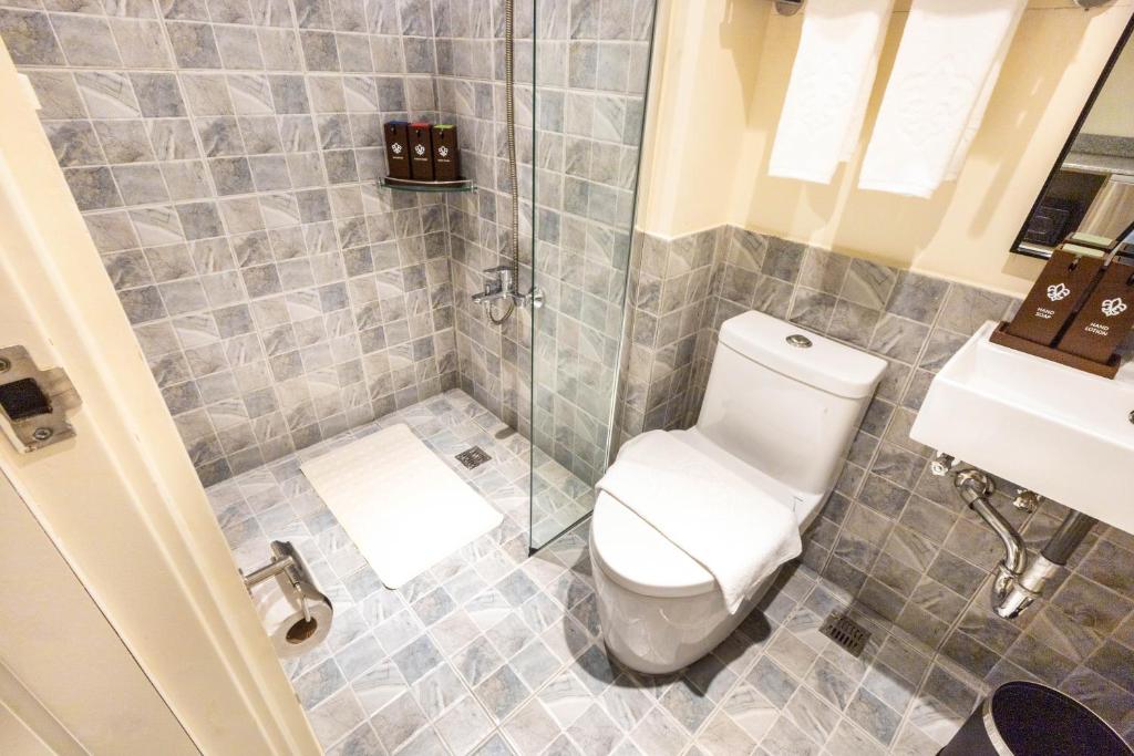 Koupelna v ubytování Noble Cebu Hotel
