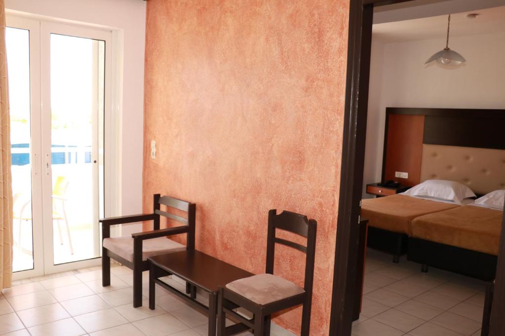Postel nebo postele na pokoji v ubytování Corali Hotel