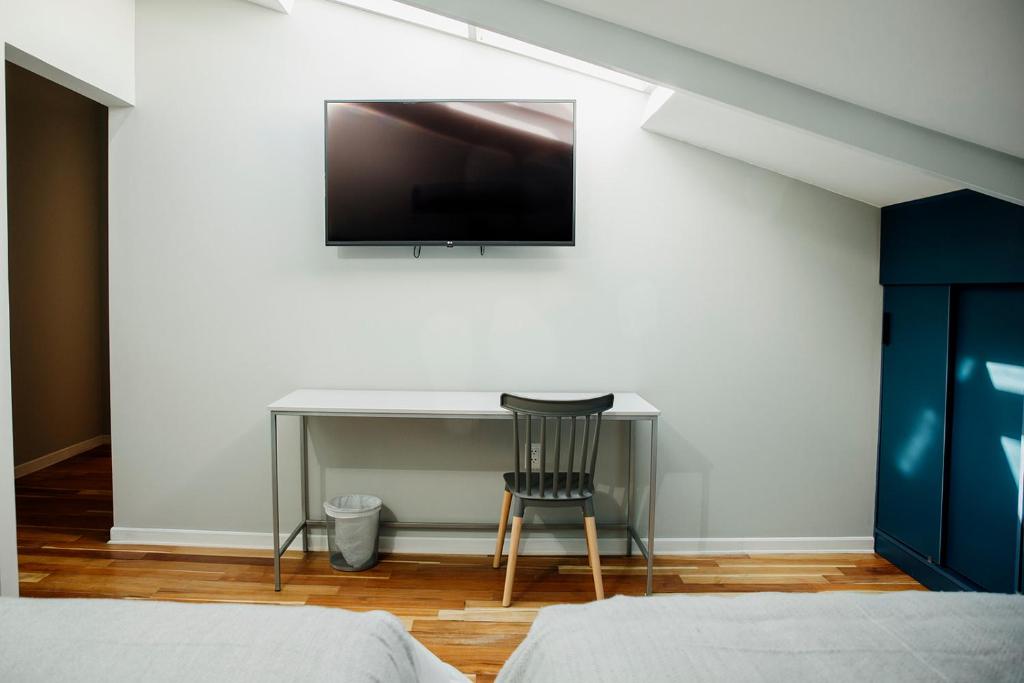 TV a/nebo společenská místnost v ubytování Kokoa Hotel Cusco