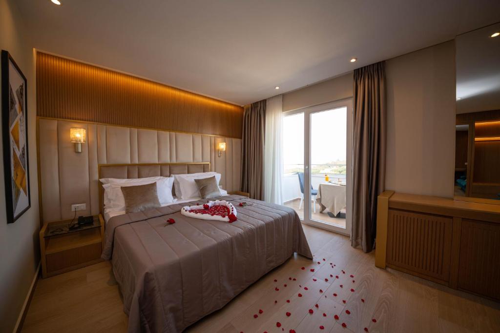 Postel nebo postele na pokoji v ubytování Merar Hotel