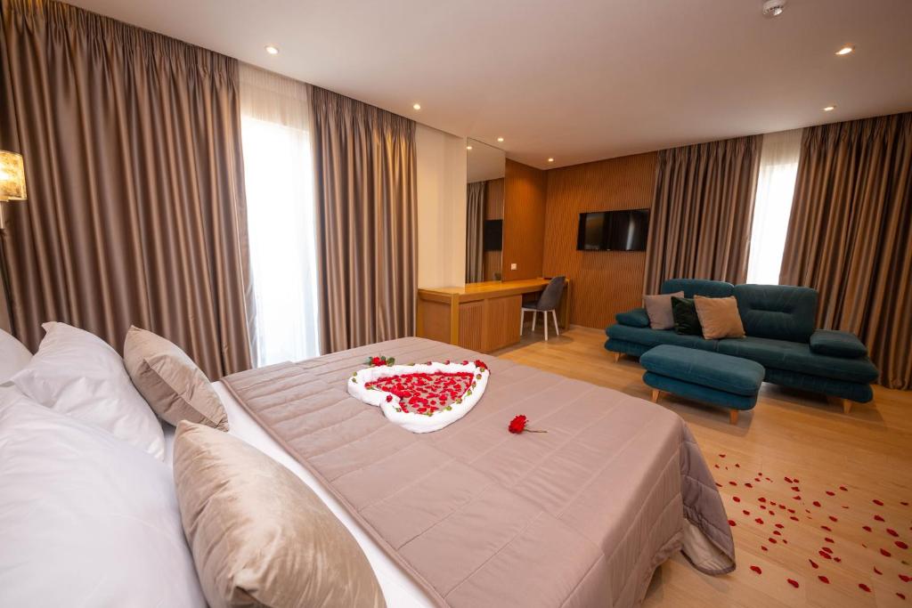 Postel nebo postele na pokoji v ubytování Merar Hotel
