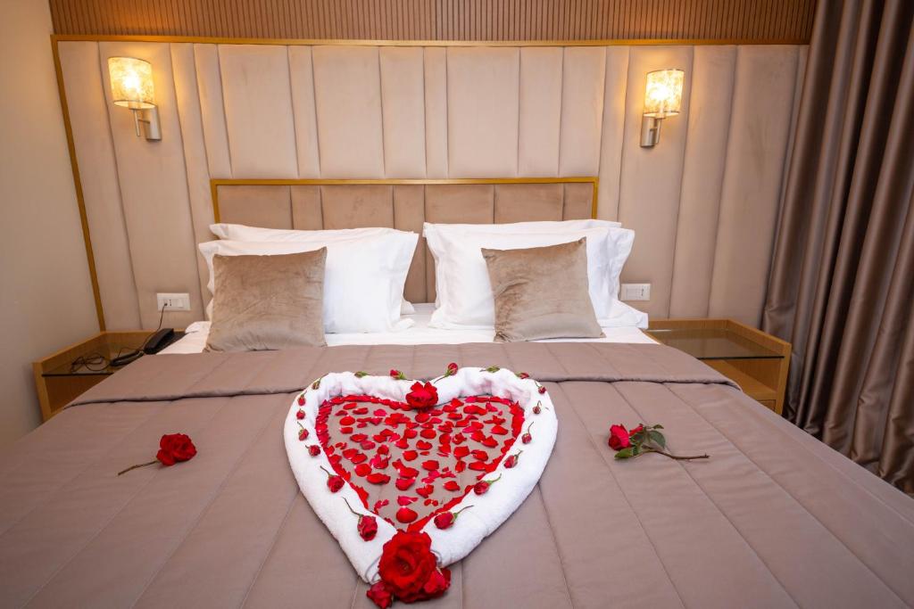 Postel nebo postele na pokoji v ubytování Merar Hotel