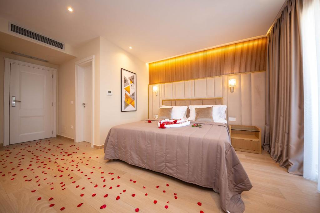 Postel nebo postele na pokoji v ubytování Merar Hotel