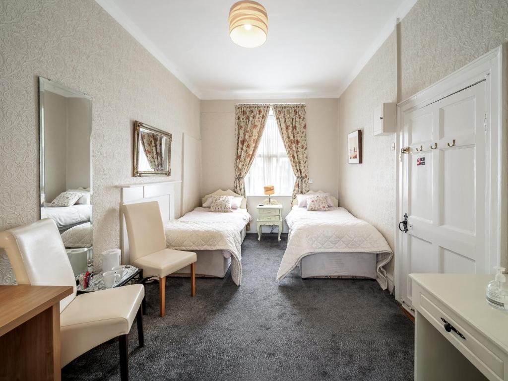 Postel nebo postele na pokoji v ubytování McCarthy's B&B