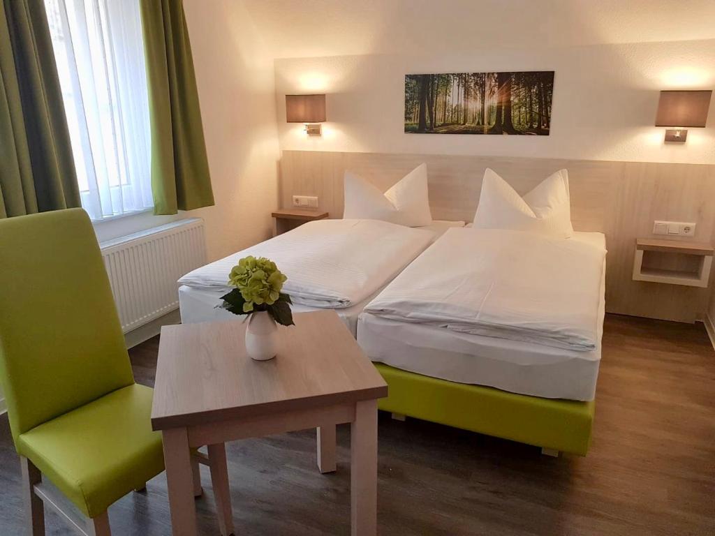 Postel nebo postele na pokoji v ubytování Pension Walkmühle