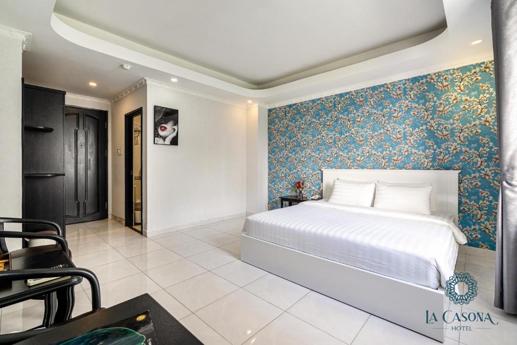 Giường trong phòng chung tại La Casona Hotel