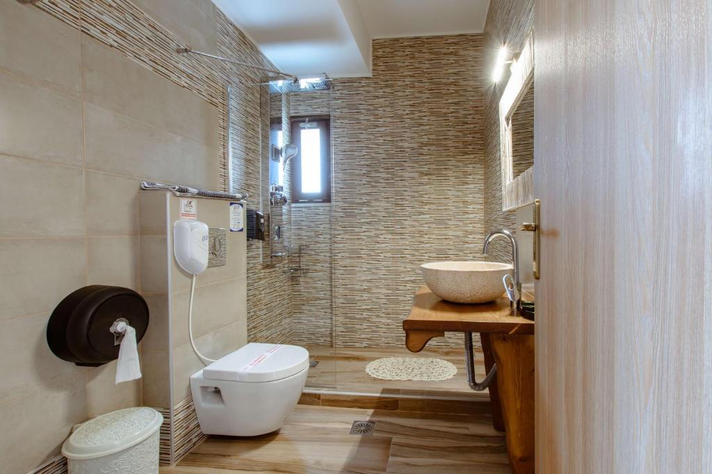 Koupelna v ubytování Deluxe Suites