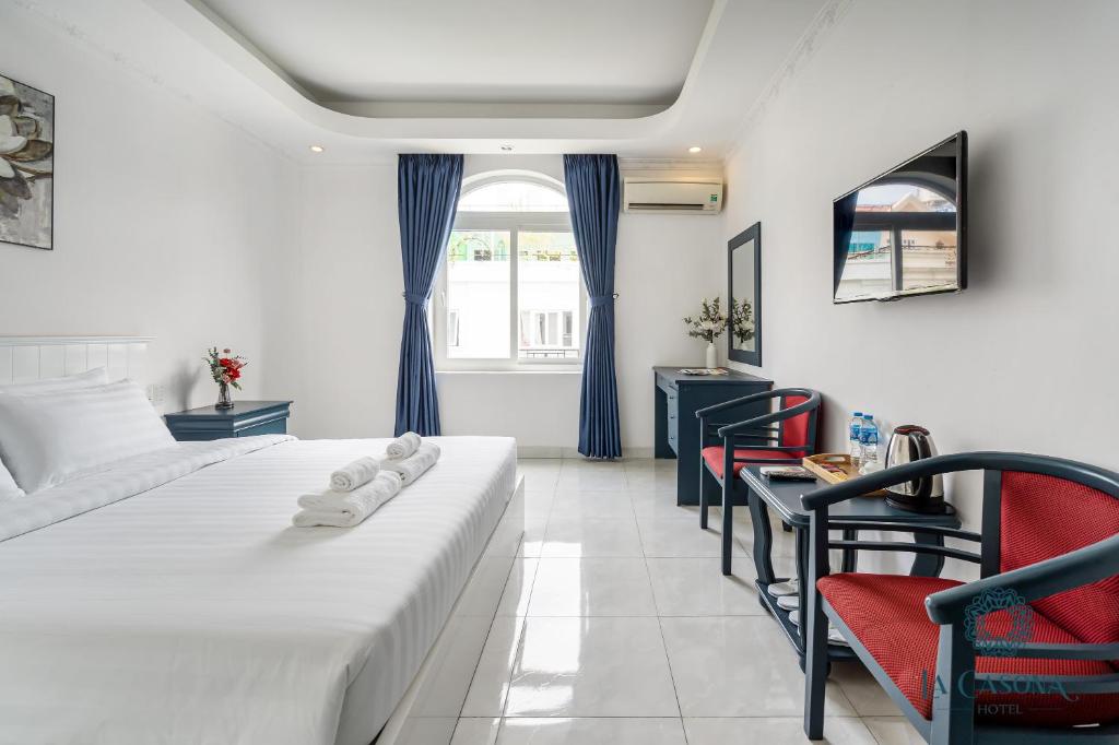 Giường trong phòng chung tại La Casona Hotel
