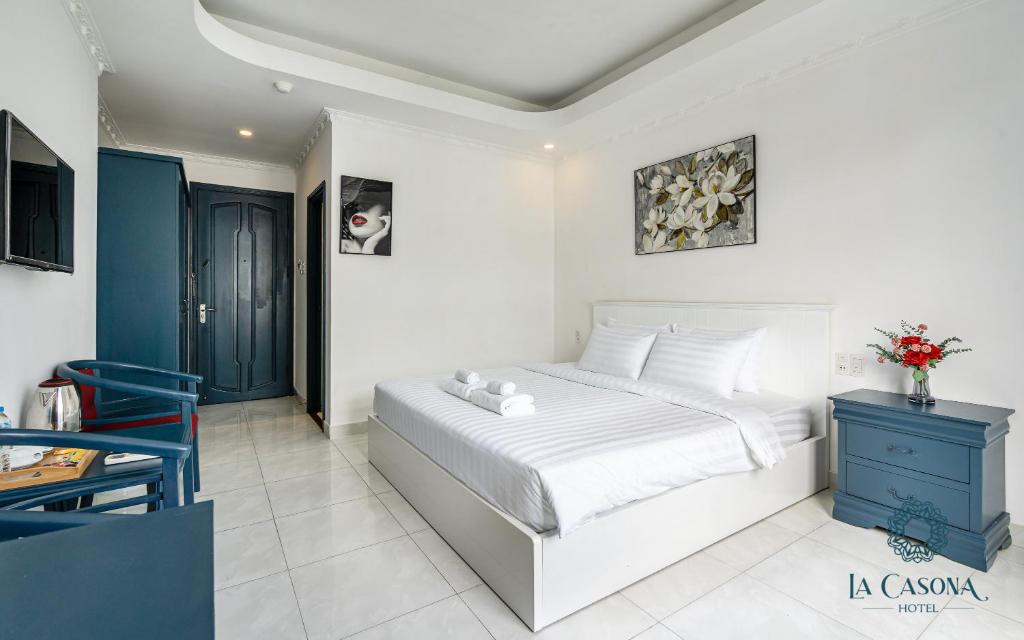 Giường trong phòng chung tại La Casona Hotel