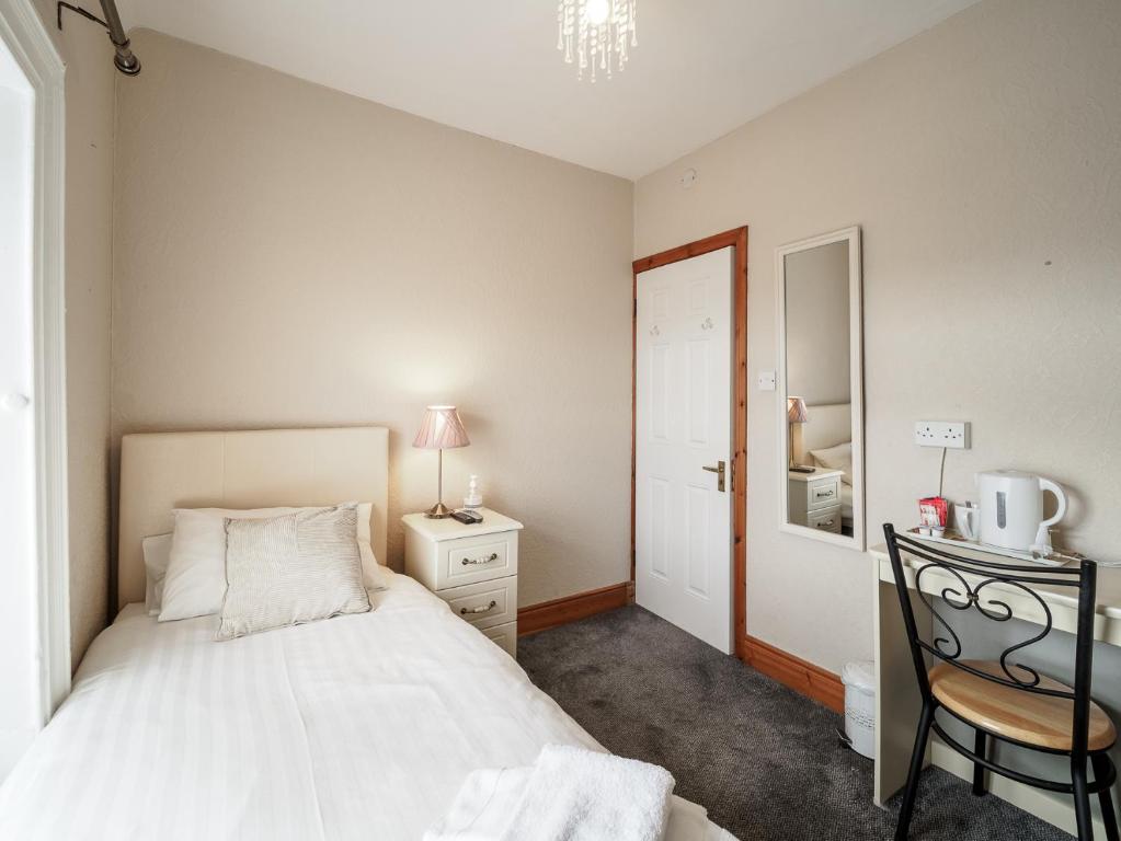 Postel nebo postele na pokoji v ubytování McCarthy's B&B