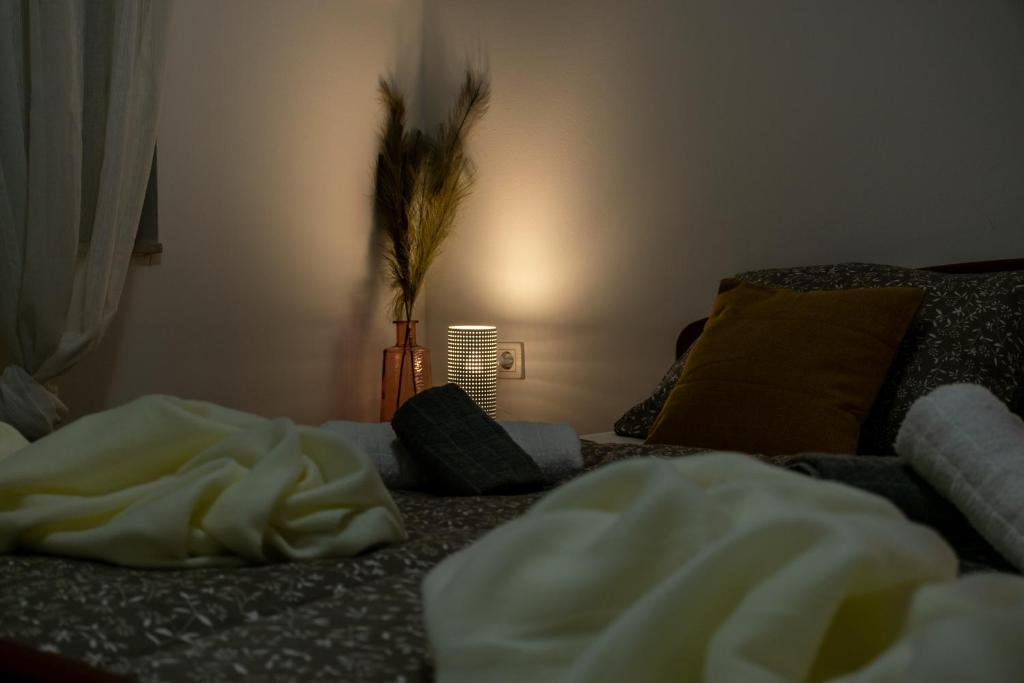 Postel nebo postele na pokoji v ubytování Apartman Tina