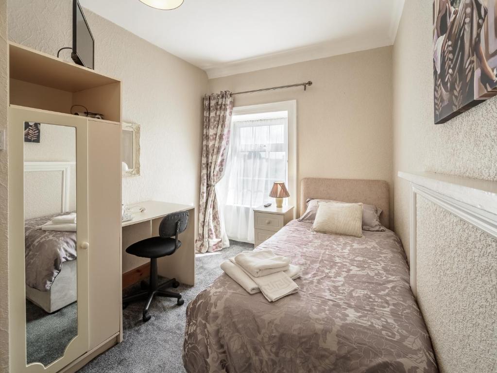 Postel nebo postele na pokoji v ubytování McCarthy's B&B